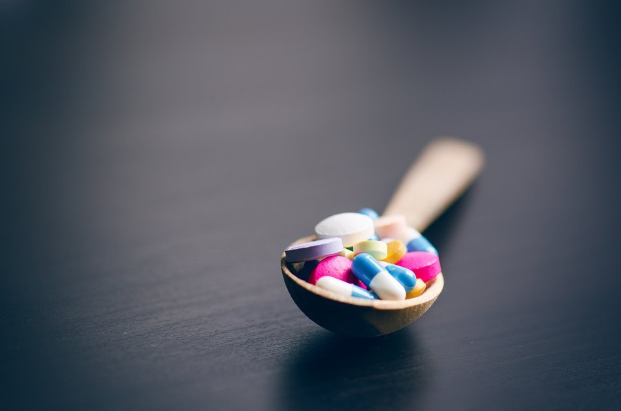pills-in-spoon